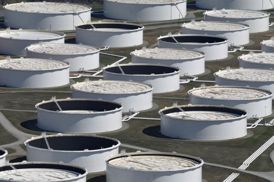 Oil falls as China widens COVID curbs; still set for weekly gain