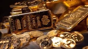 Gold edges down as markets assess Fed’s rate outlook